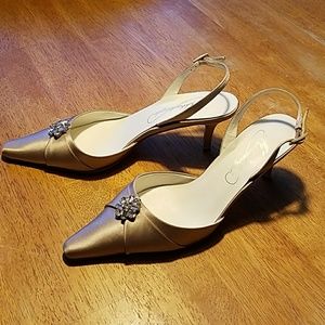Michaelangelo gold pumps, size 8B.
